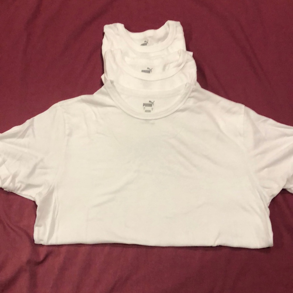 3 white Puma undershirts
